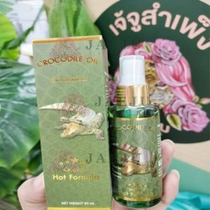 น้ำมันนวดสมุนไพร Crocodile oil Hot formula
