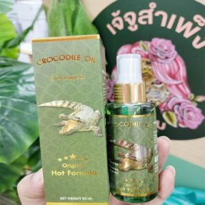 น้ำมันนวดสมุนไพร Crocodile oil Hot formula